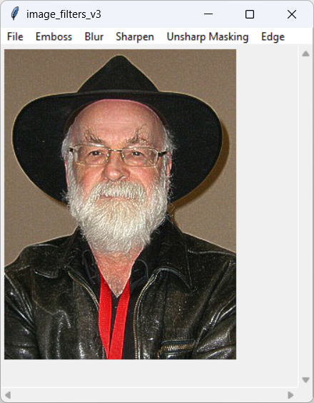 [A picture of Terry Pratchett after unsharp masking in Python]