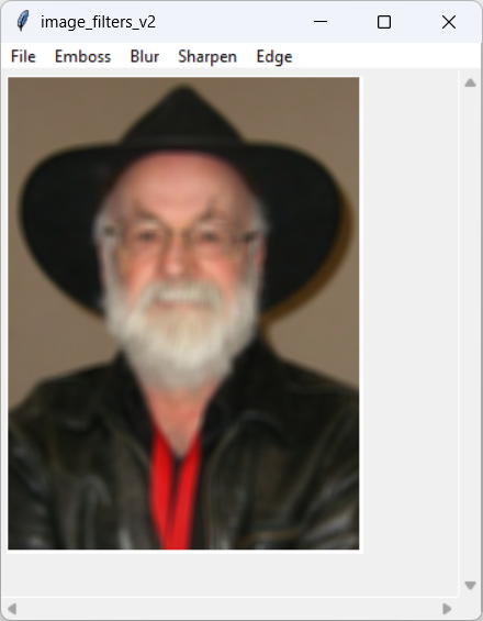 [A picture of Terry Pratchett after applying a blurring filter in Python]